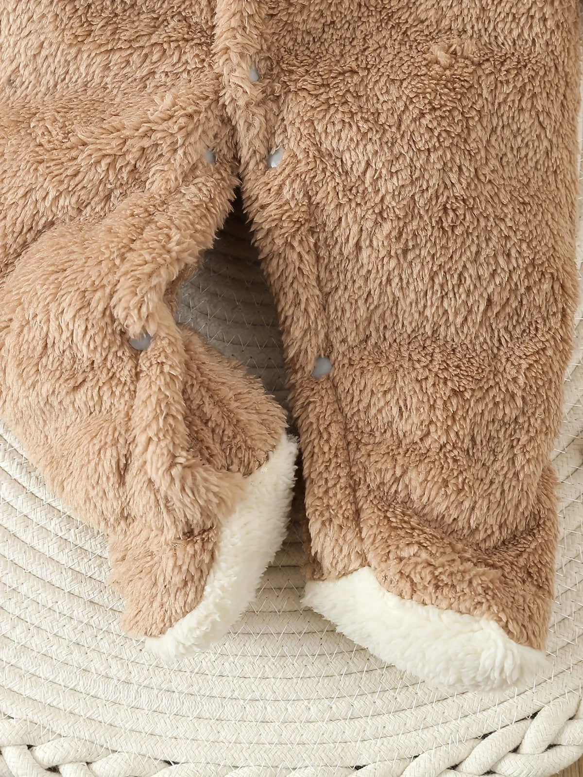Back view of the fleece bear romper