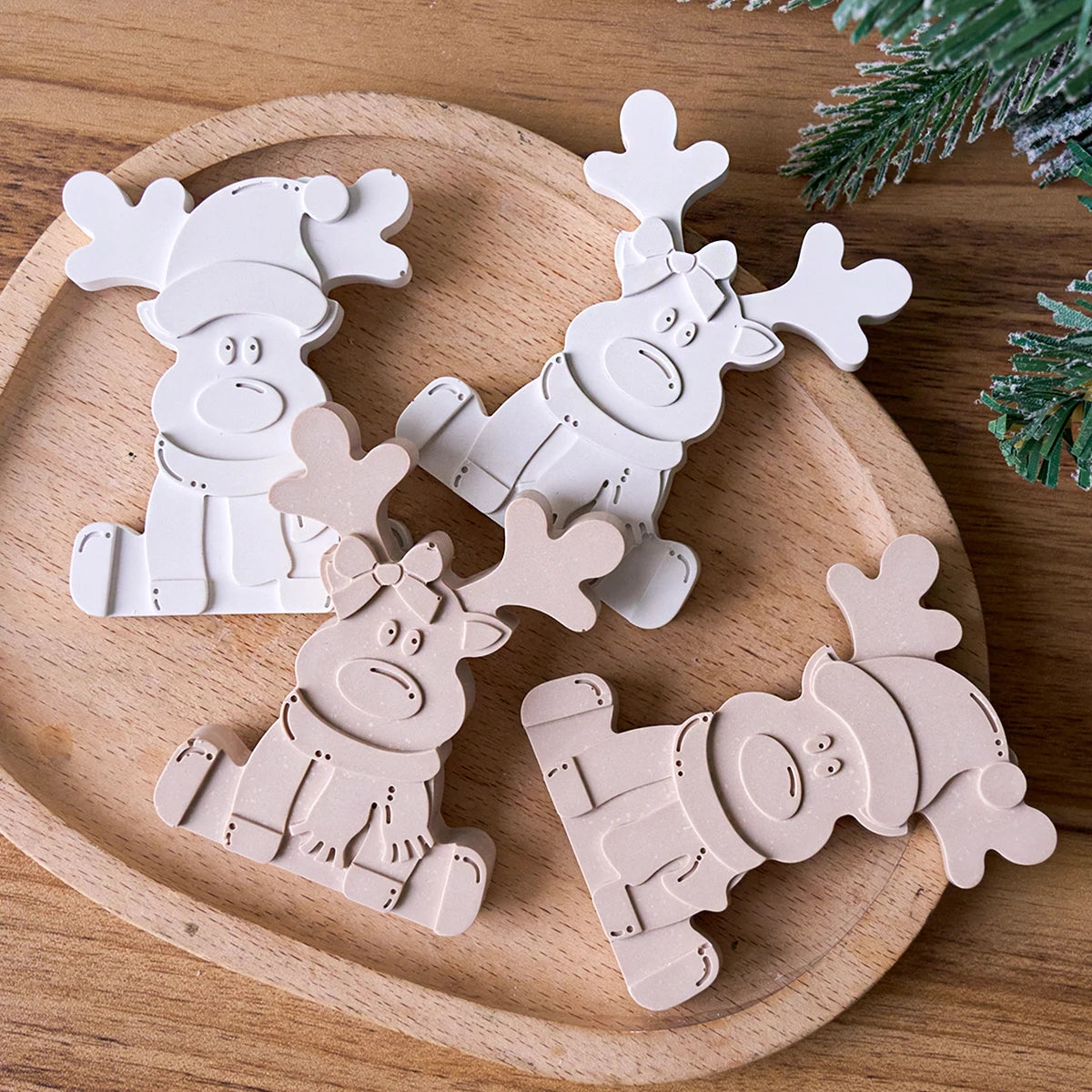 Painted plaster reindeer figures made with the Christmas mold