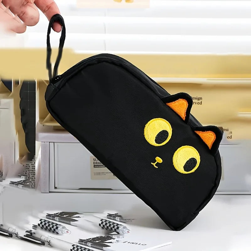 קלמר חתול שחור עם אוזניים ועיניים צהובות – מרווח עם תאים – תמונה 6