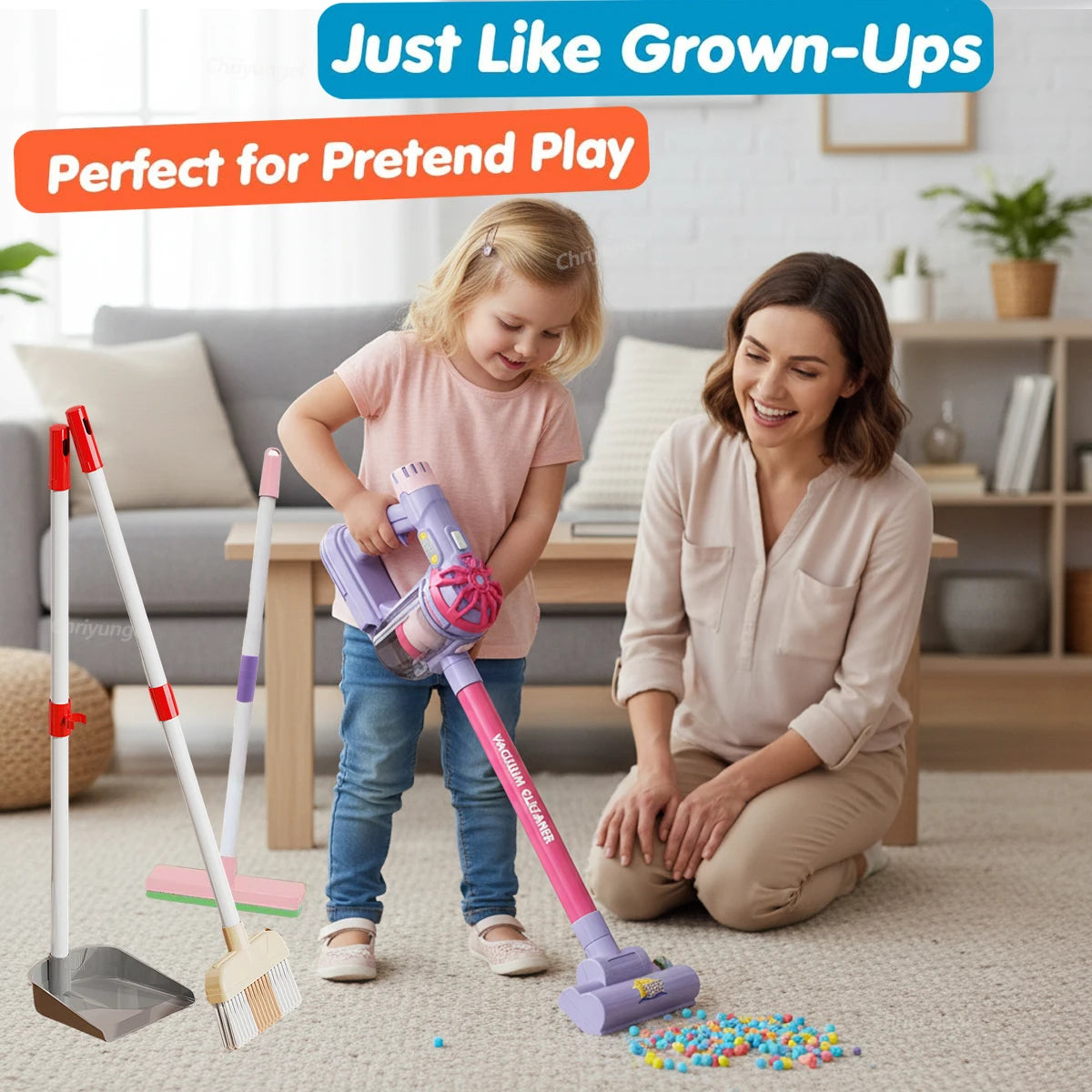 Child using a kids cleaning set with working vacuum on the floor