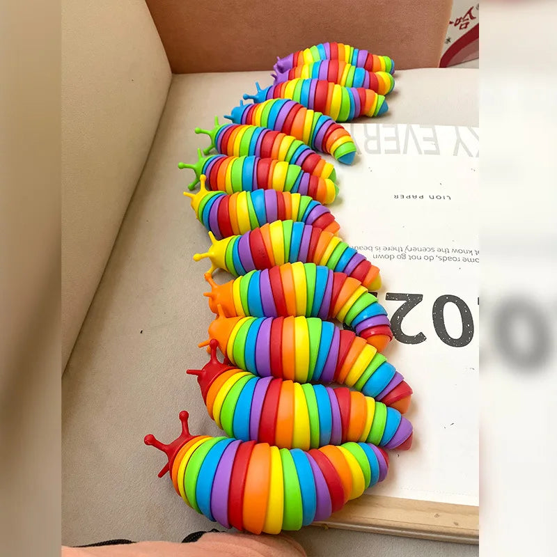 שבלול פידג׳ט מפרקי בצבעי הקשת – תמונה 3