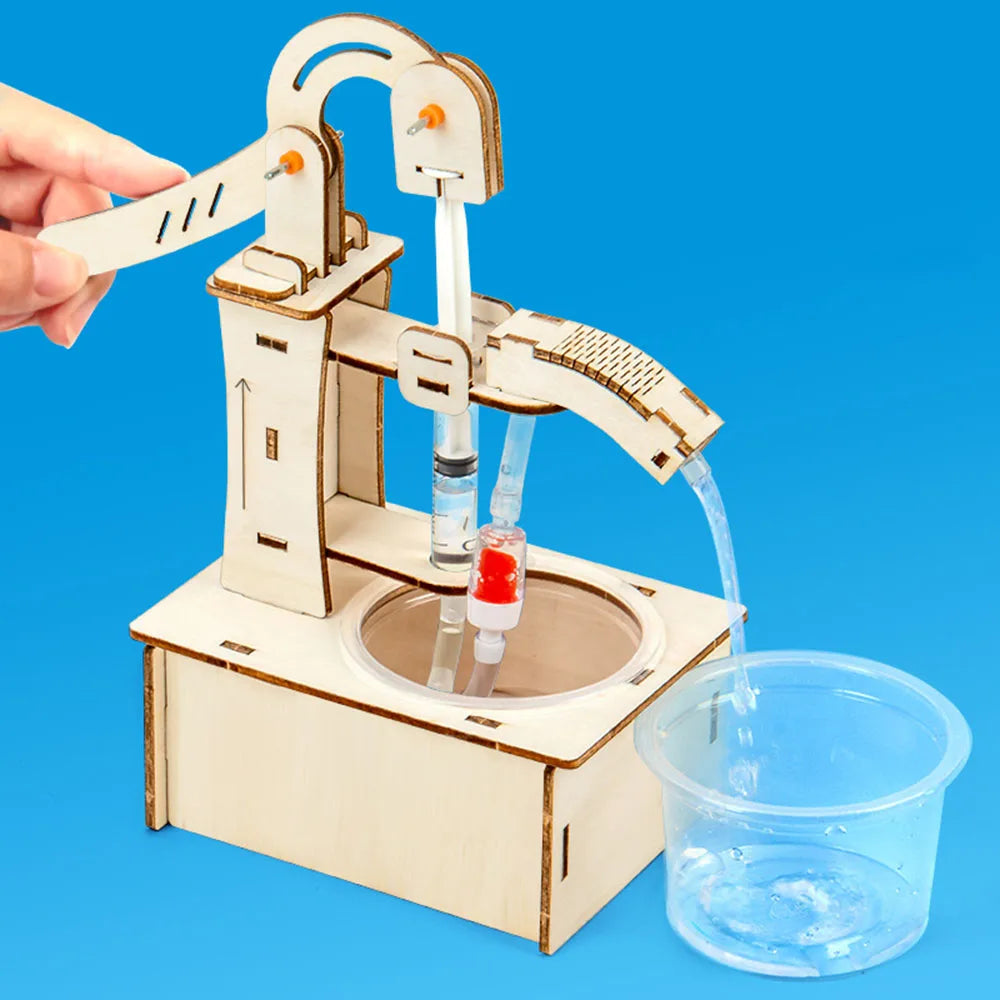 Child assembling a wooden machine from the kit