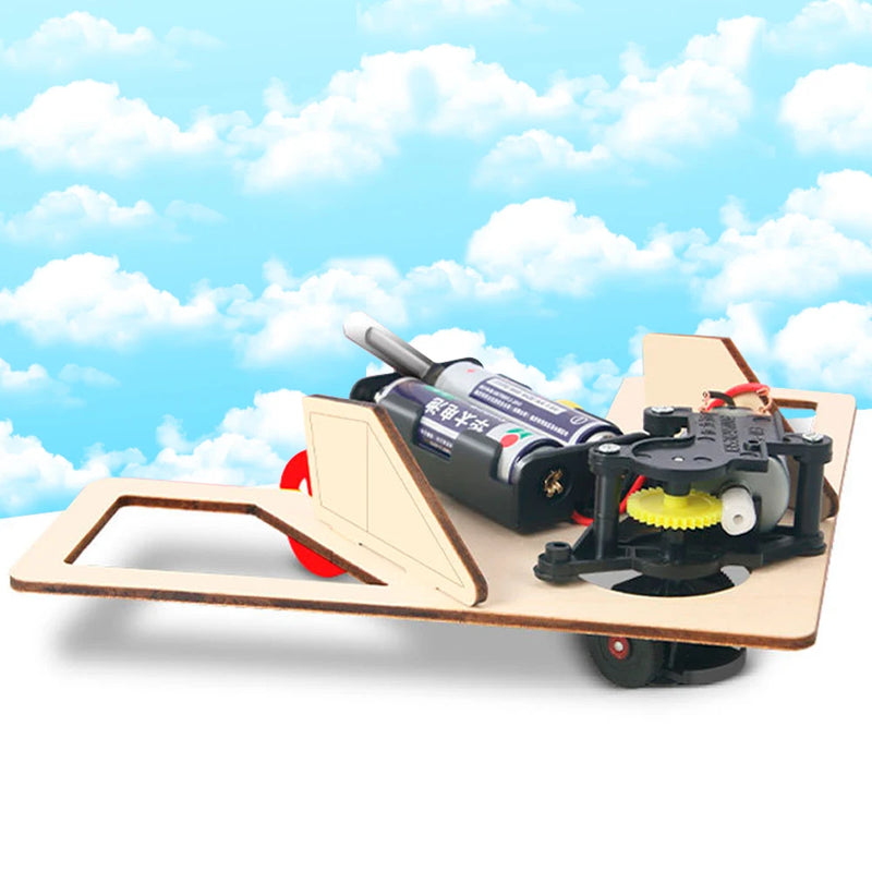 Obstacle avoiding robot car kit assembled on a table