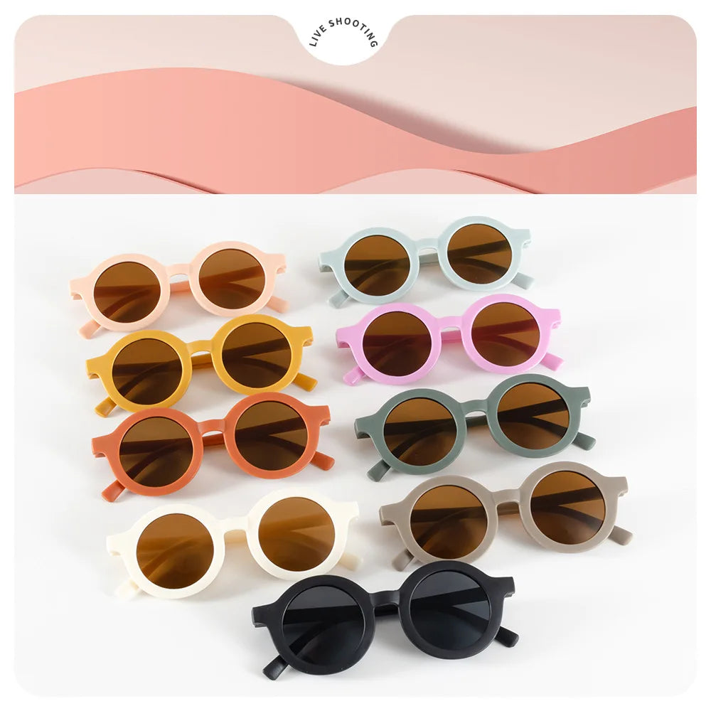 Kids round sunglasses for toddlers with dark lenses and a sturdy frame