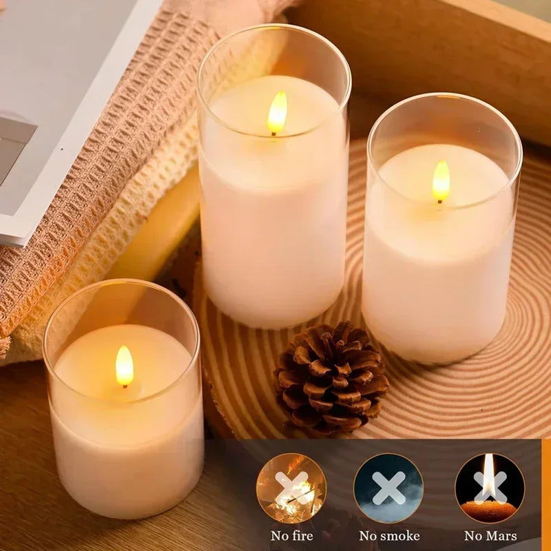 Remote control beside three flameless LED candles