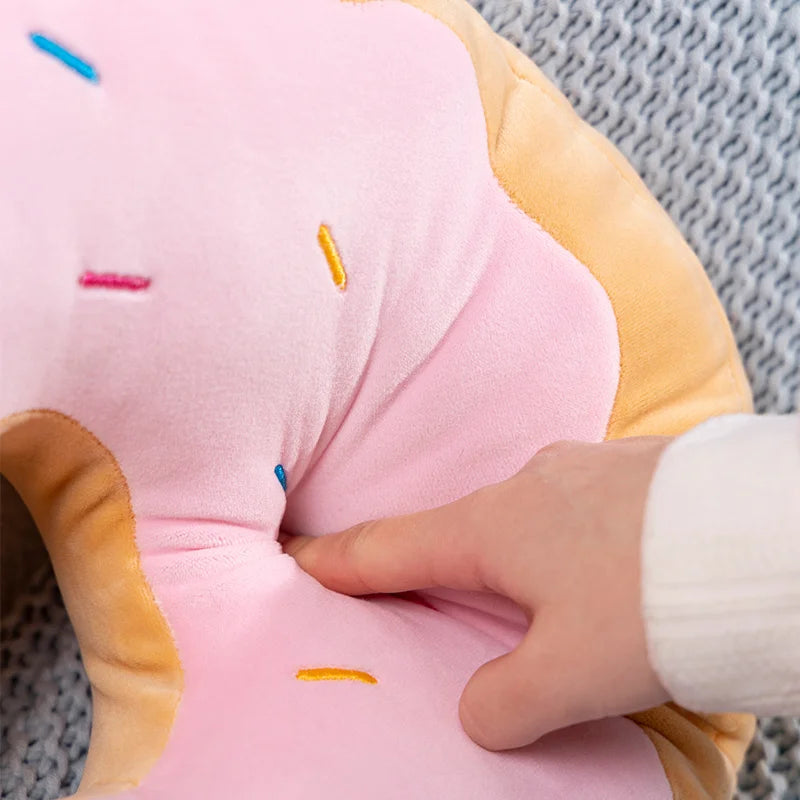 Donut pillow shown from the side with its thick shape