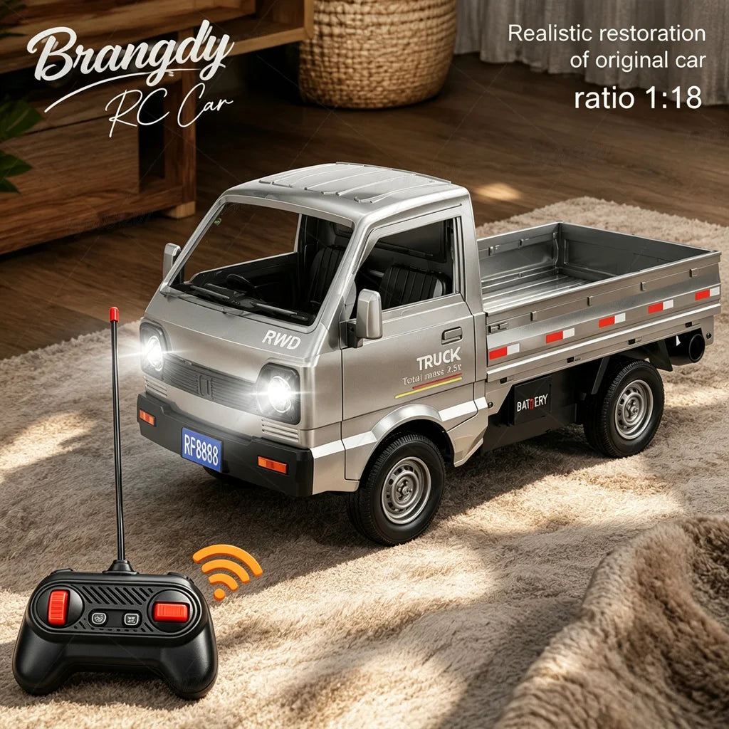 Mini RC cargo truck 1:18 with headlights on, side view