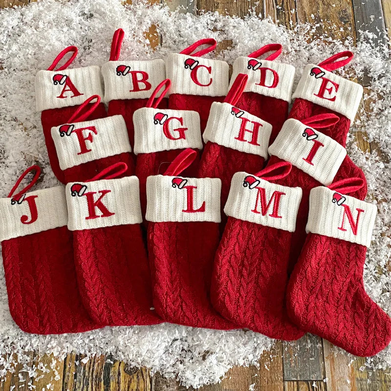 Personalized initial Christmas stocking in red knit with a letter